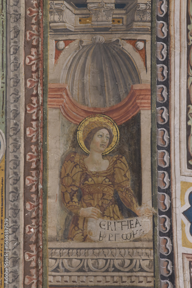 Fresco of the Cumaean Sibyl in a decorative architectural frame, Baptistery of San Giovanni, Siena, Italy, 15th century. Fresco of the Cumaean Sibyl in a decorative architectural frame, Baptistery of San Giovanni, Siena, Italy, 15th century.