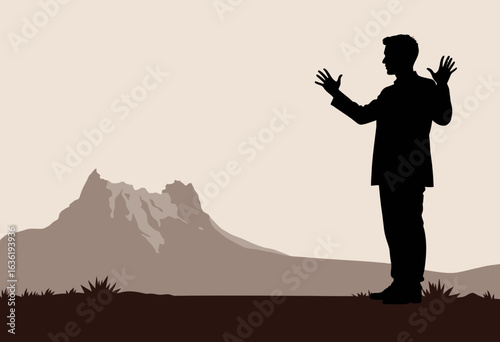 Silhouette of man gesturing with hands in front of mountain landscape  