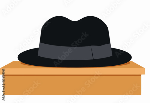 Black fedora hat resting on wooden box in minimalist style  