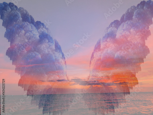Obraz na płótnie A double-exposure image superimposes two images: a breathtaking sunset over the ocean and a pair of dramatic, stylized clouds resembling large wings
