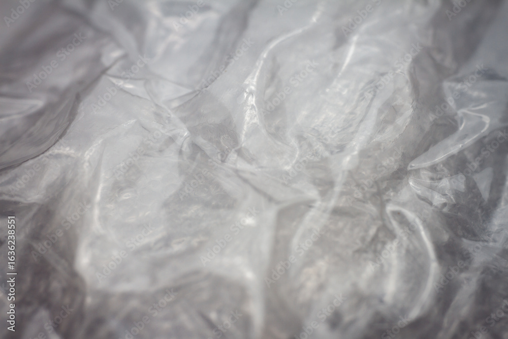 Fototapeta premium Extreme macro of plastic bubble wrap texture. Selective soft focus, shallow depth of field. Abstract dreamy background