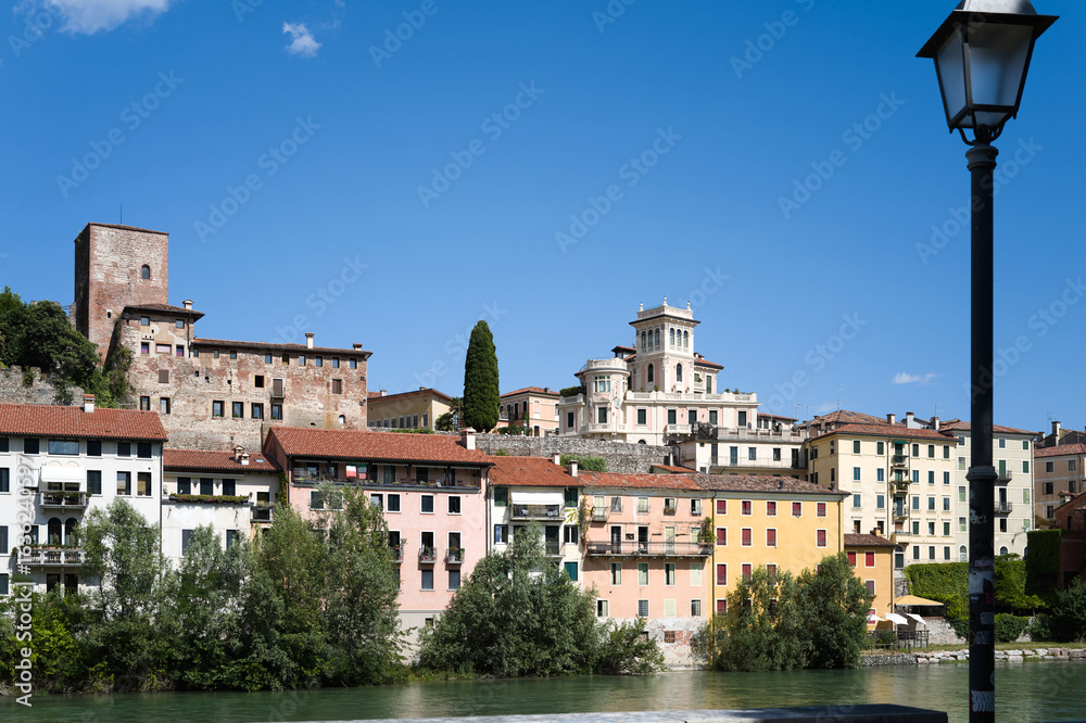 Fototapeta premium Bassano del Grappa, Vicenza, Veneto, Italy - July 9, 2025 - Views of the city, the castle, and the Alpine Bridge