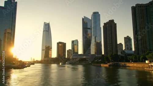 Wallpaper Mural City skyline at sunset over a river Torontodigital.ca