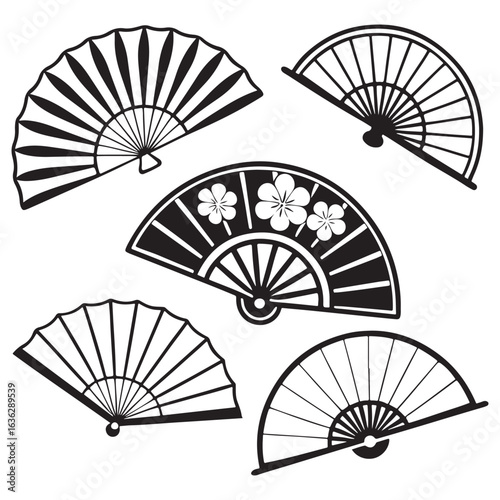 Collection of japanese hand fans with traditional designs isolated on white background