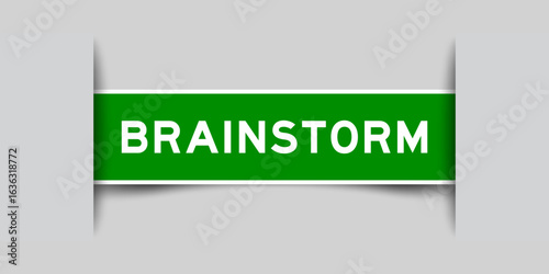 Green color square shape sticker label with word brainstorm inserted in gray background