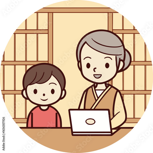 Grandmother and grandchild using a laptop together