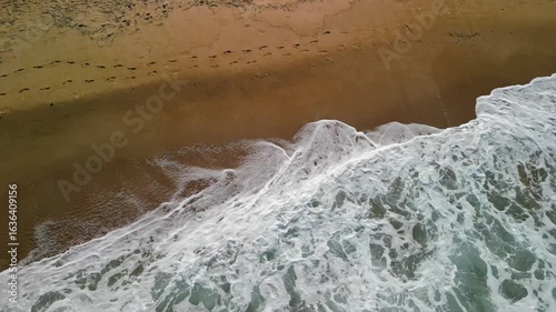 Aerial top view of Black sea coast with big waves near Alepui wild beach, Bulgaria. Drone picture. 