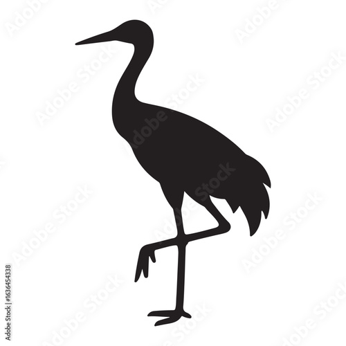 Sandhill Crane Silhouette Over Marshland at Dusk
