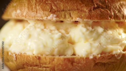 Close-up of a sandwich with creamy egg filling