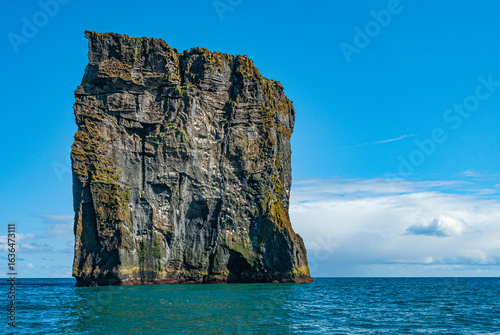 фотографія Dyrholaey is a 120 m high and precipitous headland