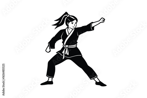 Female Martial Artist in Black Gi Practicing Punching Technique Silhouette