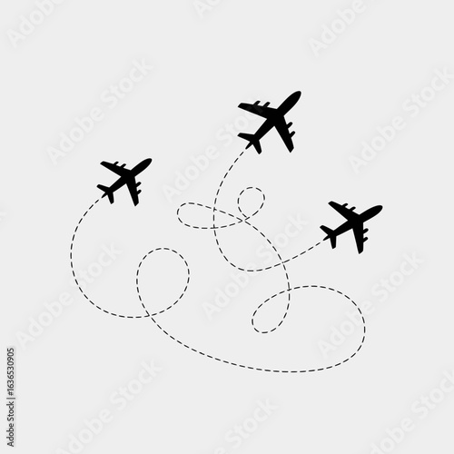 Three airplane silhouettes following dashed flight paths isolated on white background silhouette