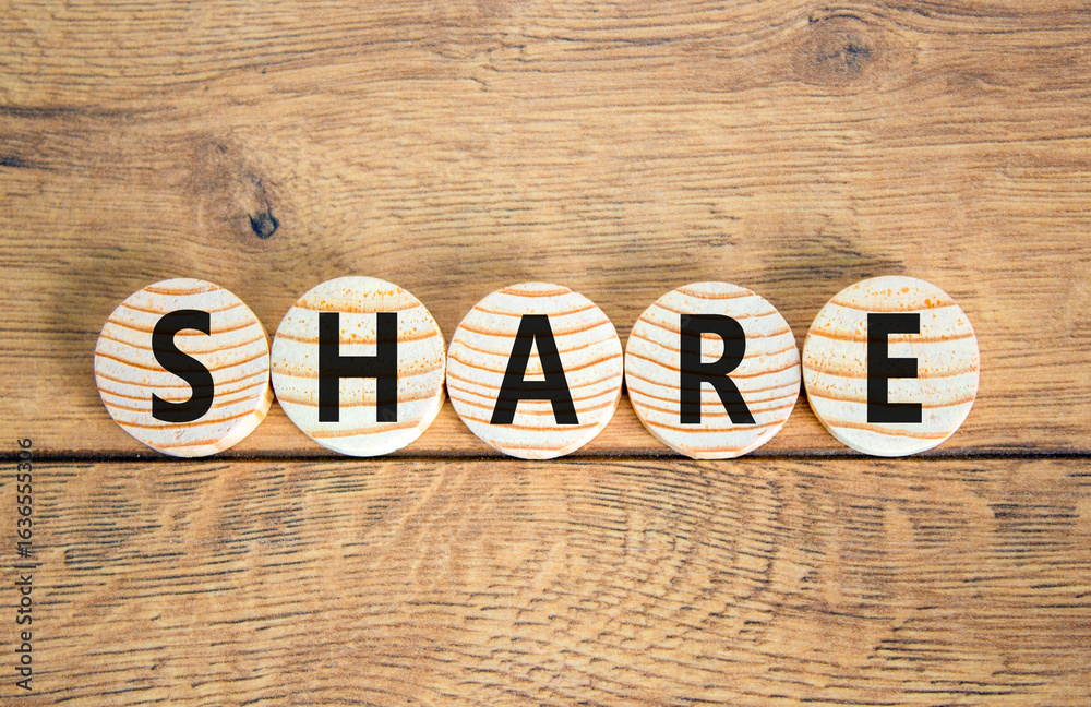 Fototapeta premium Share symbol. Concept word Share on beautiful wooden circles. Beautiful wooden table wooden background. Business lifestyle share concept. Copy space.