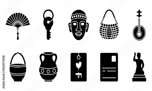 Assortment of cultural and historical objects including fan key mask and vase face tribal