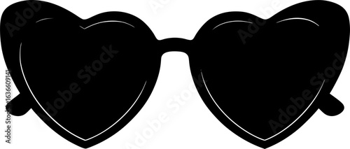 Heart Shaped Sunglasses: A pair of stylish sunglasses with heart-shaped lenses, exuding a sense of romance, fun, and summer vibes, perfect for adding a touch of flair to any look. 