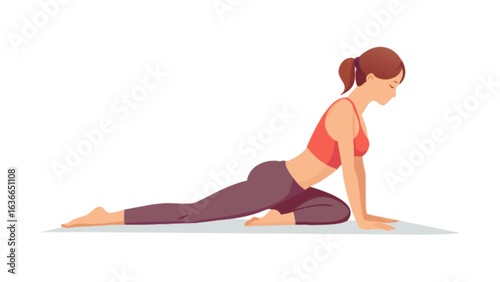 Woman in pigeon pose stretching her body on a yoga mat for fitness and wellness training at home or studio