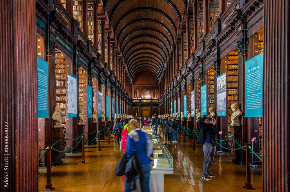 Fototapeta premium Tourists at the Iconic Trinity College Library in Dublin, Ireland
