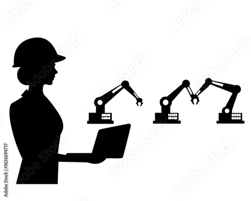 Engineer overseeing robotic arms with laptop silhouette