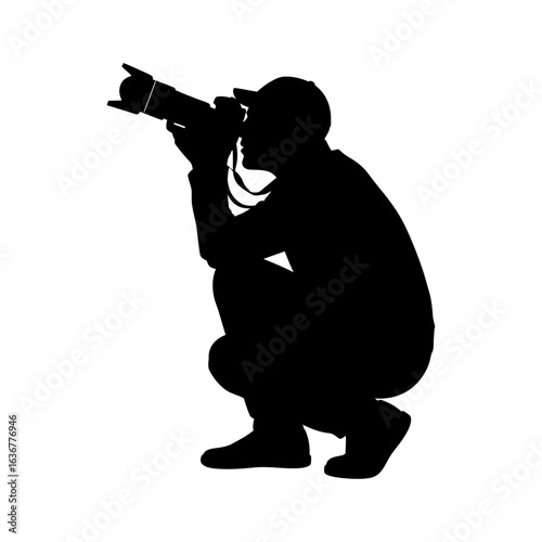 Black Silhouette of Photographer Crouching with Camera