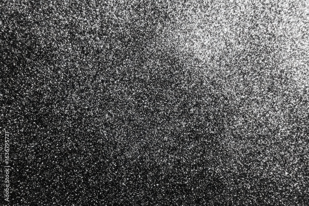 Fototapeta premium Black and white speckled texture background