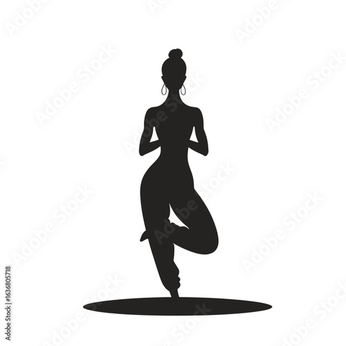 Woman silhouette in yoga tree pose