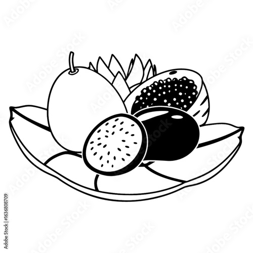 Exotic fruit arrangement on a leaf-shaped plate, perfect for healthy eating and wellness concepts