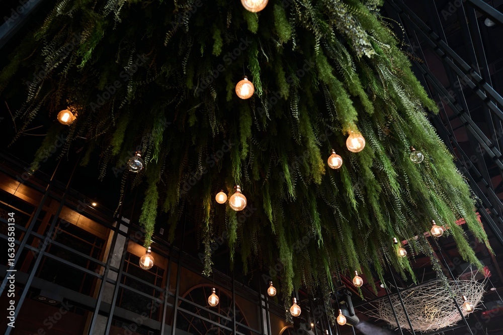 Naklejka premium Modern Interior with Hanging Plants and Edison Lights