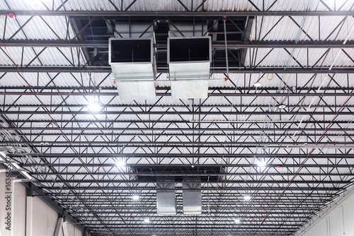 Air conditioning vents mounted on steel ceiling of cold storage warehouse