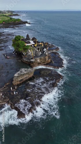 Aerial View of Pura Tanah Lot Temple and Blue Ocean Waves, Bali, Indonesia