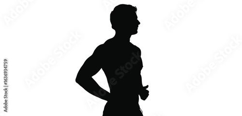 Silhouette of a muscular man standing with hands on hips
