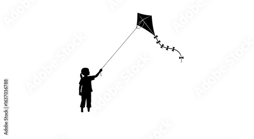 Silhouette of a child flying a kite with a tail against a white background