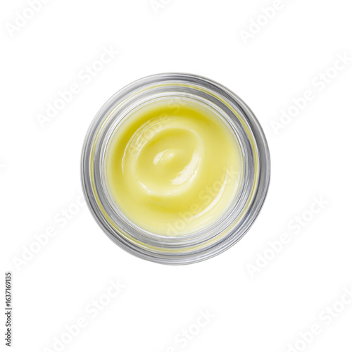 Overhead View of Pale Yellow Cream in a Clear Jar