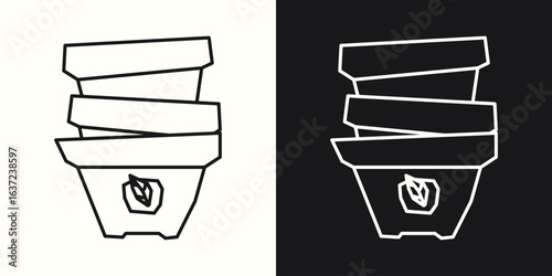 Black Line Art and White Line Art Cutout Icons of a Bag of Soil