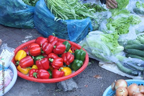 basket of fresh bell peppers in the market