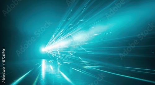 Turquoise light streaks with motion blur effect, representing speed, technology