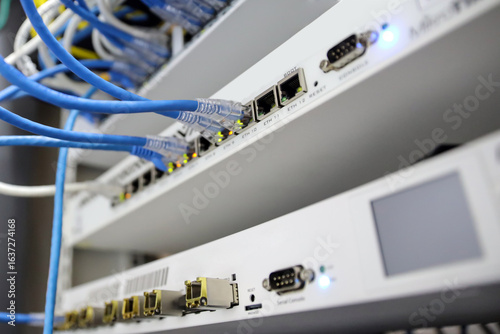 фотографія LAN internet network cable or RJ45 UTP fiber optic connect to network management equipment for cloud computing computer data link file transfer or wifi networking devices technology server system