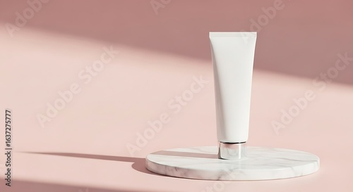Sleek white cosmetic cream tube mockup on a minimal marble podium.
