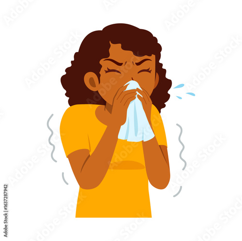 African American woman sneezing into a tissue, she is sick with a cold or flu.