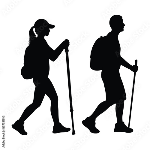Silhouette of hikers trekking with backpacks and walking sticks outdoor adventure travel trip