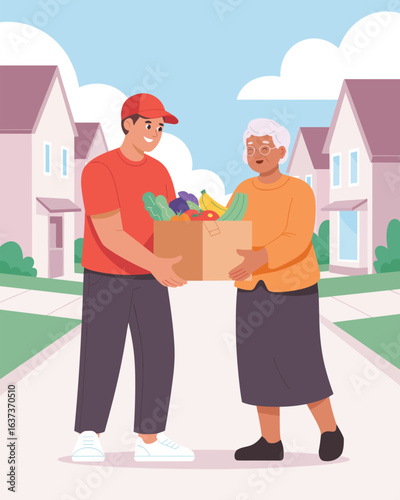 Volunteer delivering a box of fresh groceries and food to a senior woman