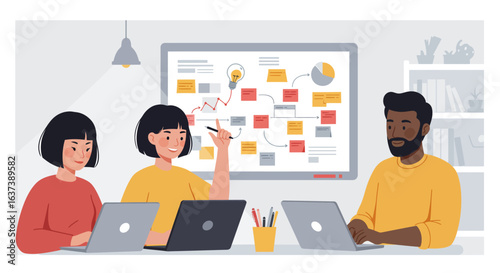 Diverse Team Collaborating on Business Strategy with Laptop Computers