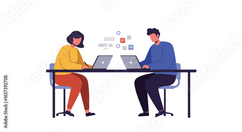 Two people working on laptops, sitting at a shared desk, with documents in background