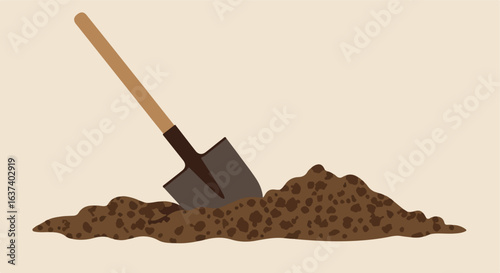 Gardening tool in the ground, brown soil. Wooden handle and tan background
