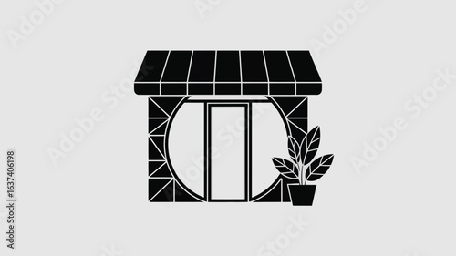 Charming storefront facade with a stylish awning and a potted plant creating an inviting modern business entrance