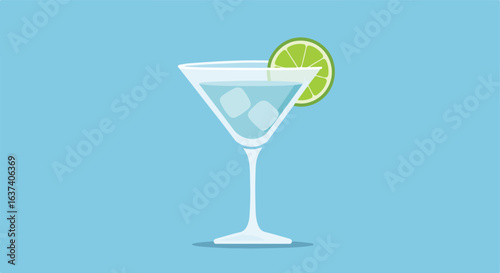 Refreshing drink in a martini glass with ice and lime slice on a light blue background