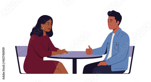 Couple sits at table having a conversation, one person gives a thumbs up of approval