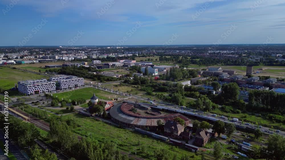 Historic round locomotive shed trains depot. Dramatic aerial view flight drone Historic round locomotive shed trains depot. Dramatic aerial view flight drone