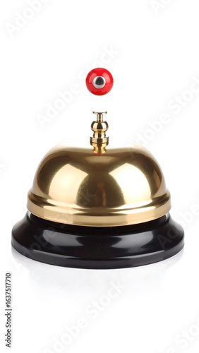 Polished gold bell, red button