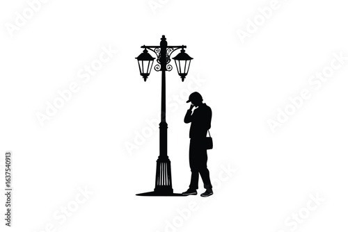 Silhouette of a Man in a Hat Standing Beside a Street Lamp in a City at Night Captured in a Vintage Style Exuding a Sense