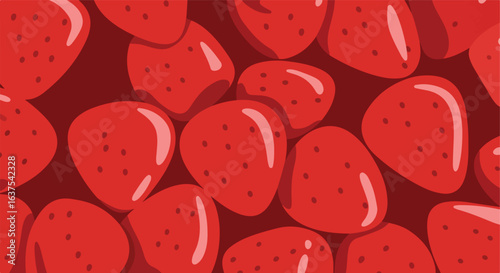 Fresh fruit featuring rows of strawberries, colored in red, with dark seeds around